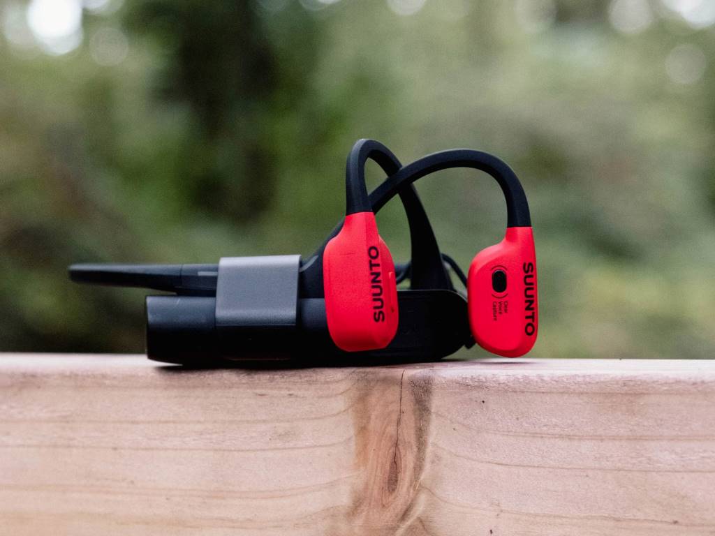 Suunto Wing bone conduction headphones with LED lights for night cycling.