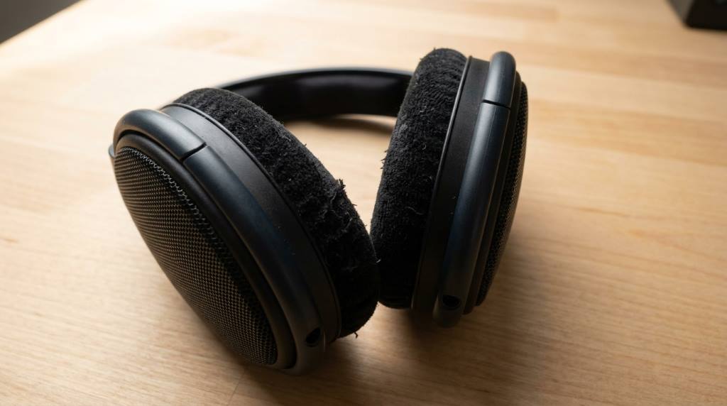 New velour ear pads next to Sennheiser HD 599 headphones